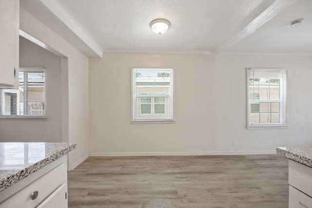 3919 E Butler, Fresno, CA 93702 - unfurnished dining area with light wood-style floors and plenty of natural light