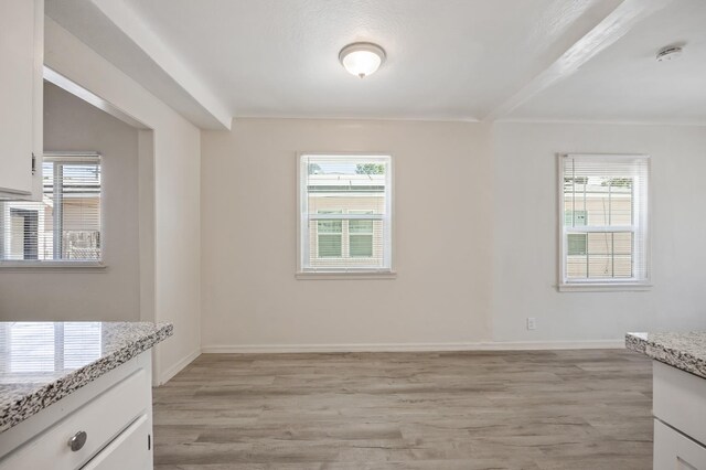 3919 E Butler, Fresno, CA 93702 - unfurnished dining area with light wood-style floors and plenty of natural light