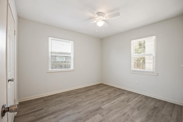 3919 E Butler, Fresno, CA 93702 - unfurnished room with wood finished floors and a ceiling fan