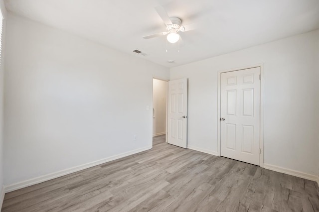 3919 E Butler, Fresno, CA 93702 - unfurnished bedroom with light wood-style floors and a ceiling fan