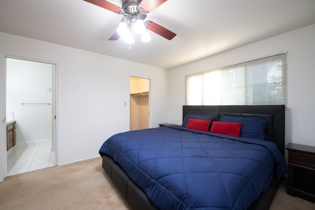 6482 N 5th St, Fresno, CA 93710 - bedroom featuring carpet floors, a walk in closet, connected bathroom, and a ceiling fan