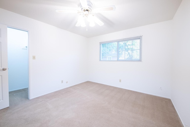 6482 N 5th St, Fresno, CA 93710 - carpeted spare room with ceiling fan and baseboards