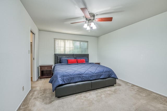 6482 N 5th St, Fresno, CA 93710 - carpeted bedroom featuring baseboards and ceiling fan