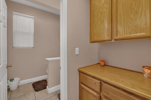 1085 Stanford Ave, Madera, CA 93637 - bathroom with tile patterned flooring and baseboards