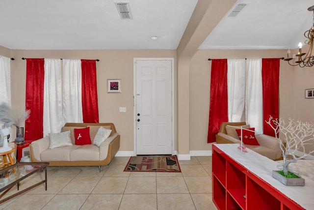 1085 Stanford Ave, Madera, CA 93637 - entryway featuring a chandelier and light tile patterned floors