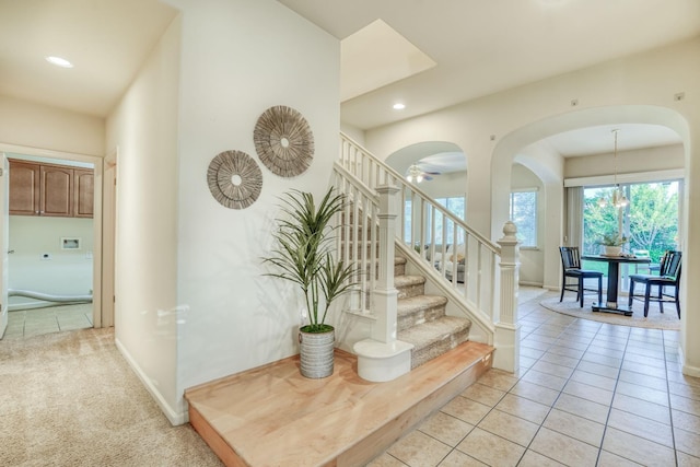 3202 Everglade Ave, Clovis, CA 93619 - entryway with stairs, arched walkways, light tile patterned floors, and recessed lighting