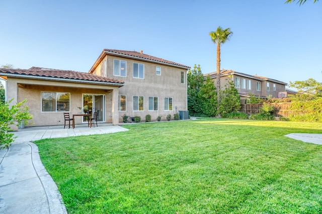 3202 Everglade Ave, Clovis, CA 93619 - back of property featuring stucco siding, a patio area, and a tiled roof
