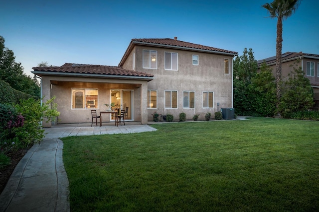 3202 Everglade Ave, Clovis, CA 93619 - back of property featuring a yard, stucco siding, a patio, and a tiled roof