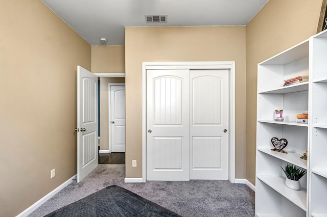 976 Daisy Ct, Dinuba, CA 93618 - unfurnished bedroom featuring carpet and a closet