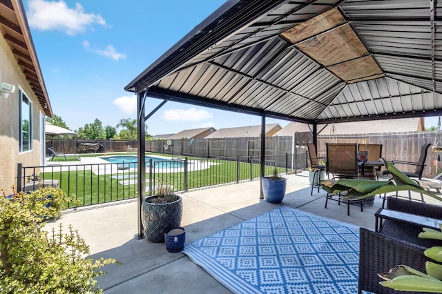 976 Daisy Ct, Dinuba, CA 93618 - fenced backyard featuring a patio area and a gazebo