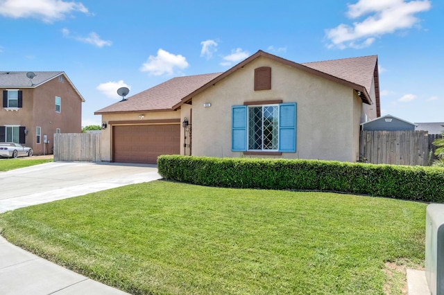 976 Daisy Ct, Dinuba, CA 93618 - view of front of property featuring concrete driveway, an attached garage, and stucco siding