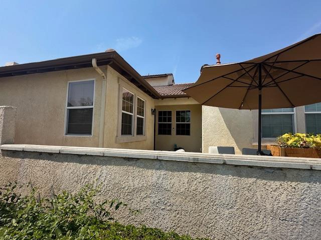 2400 Garda Corte, Chowchilla, CA 93610 - view of property exterior with stucco siding