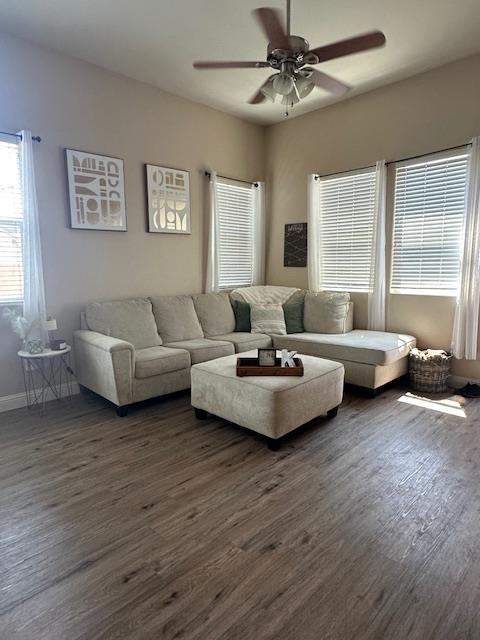 2400 Garda Corte, Chowchilla, CA 93610 - living area featuring dark wood-style flooring and a ceiling fan