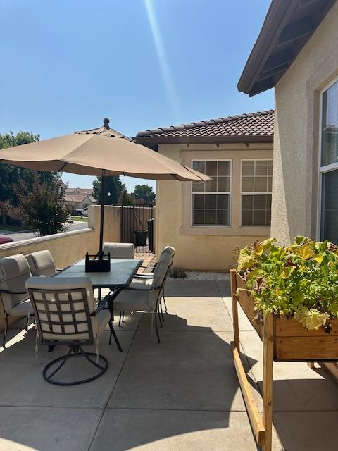 2400 Garda Corte, Chowchilla, CA 93610 - view of patio / terrace featuring outdoor dining area