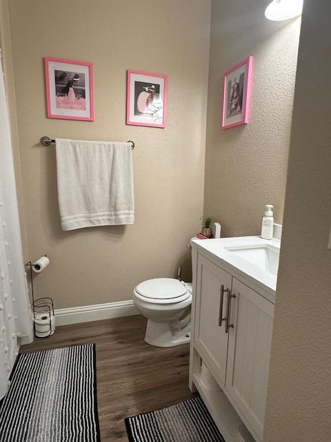 2400 Garda Corte, Chowchilla, CA 93610 - bathroom with vanity and wood finished floors