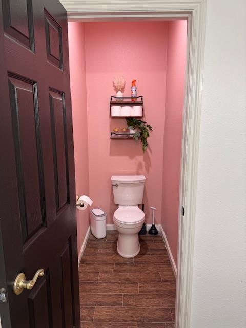 2400 Garda Corte, Chowchilla, CA 93610 - bathroom with toilet and wood finished floors
