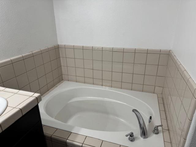 2400 Garda Corte, Chowchilla, CA 93610 - bathroom featuring a garden tub and vanity