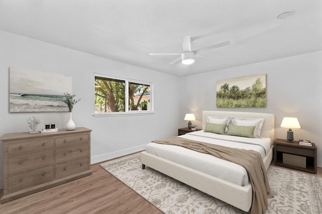 644 W Yale Ave, Fresno, CA 93705 - bedroom featuring light wood-style floors and ceiling fan