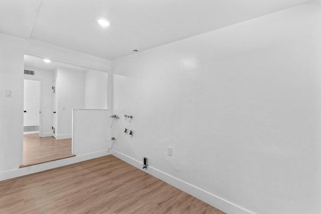 644 W Yale Ave, Fresno, CA 93705 - empty room featuring light wood-style floors and recessed lighting