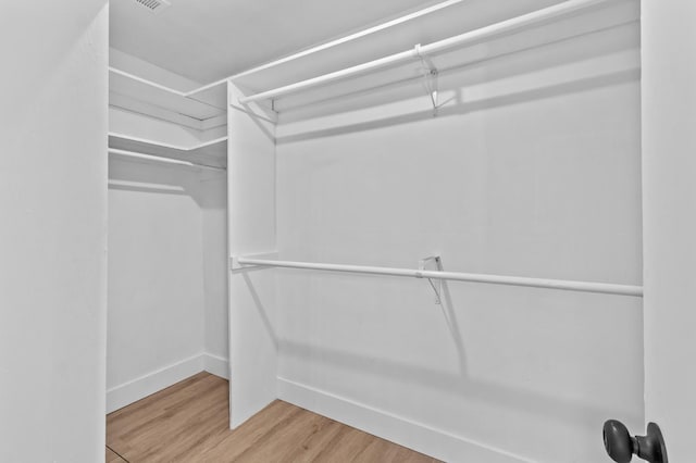 644 W Yale Ave, Fresno, CA 93705 - walk in closet featuring light wood-type flooring