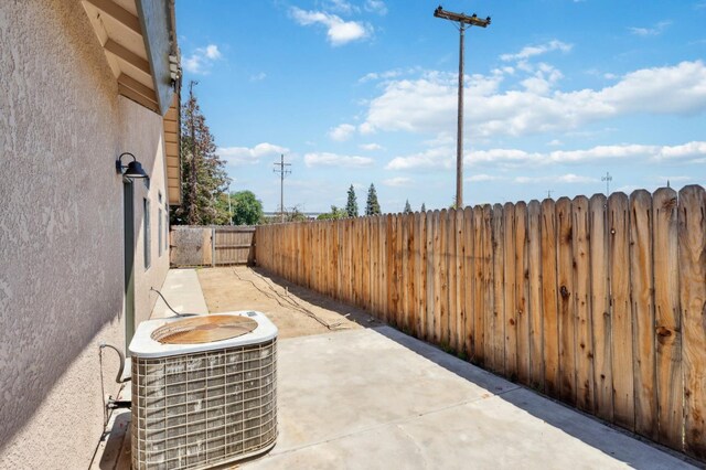 2261 Magill Ave, Clovis, CA 93611 - fenced backyard featuring a patio area