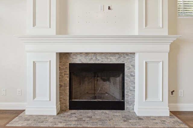 2261 Magill Ave, Clovis, CA 93611 - detailed view of a fireplace with flush hearth and wood finished floors