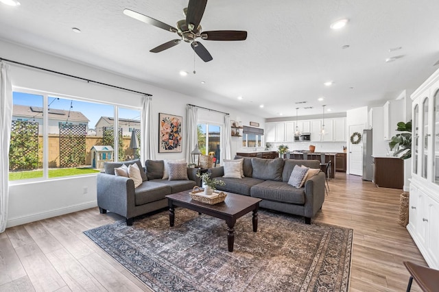 827 Vintage Ave, Clovis, CA 93619 - living room with ceiling fan, recessed lighting, and light wood-style flooring
