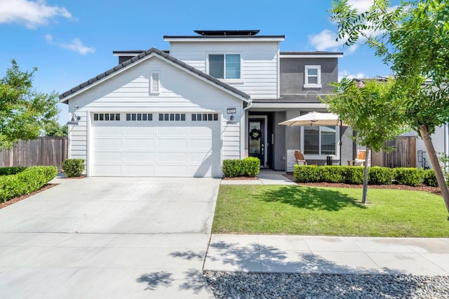 827 Vintage Ave, Clovis, CA 93619 - traditional-style home with an attached garage, concrete driveway, and roof mounted solar panels