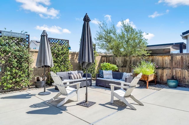827 Vintage Ave, Clovis, CA 93619 - fenced backyard featuring an outdoor living space and a patio