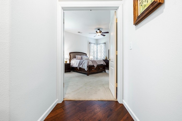 2549 Whiteash Ave, Clovis, CA 93619 - hallway featuring dark wood-style flooring and baseboards