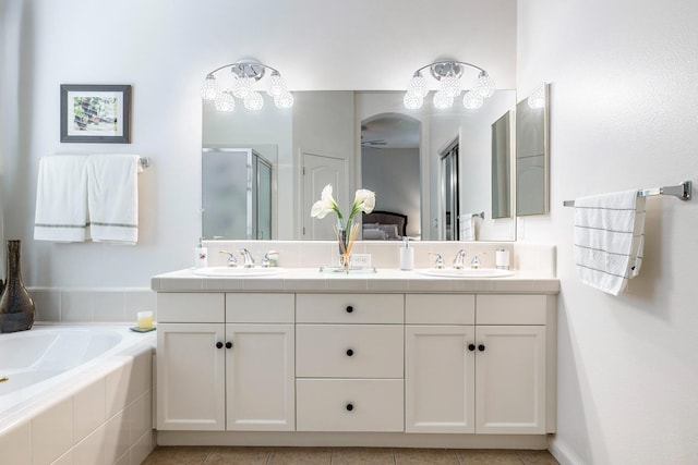 2549 Whiteash Ave, Clovis, CA 93619 - bathroom featuring a stall shower, double vanity, a garden tub, and tile patterned floors
