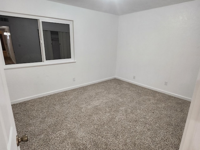 6536 N Tracy Ave, Fresno, CA 93722 - empty room featuring baseboards and carpet
