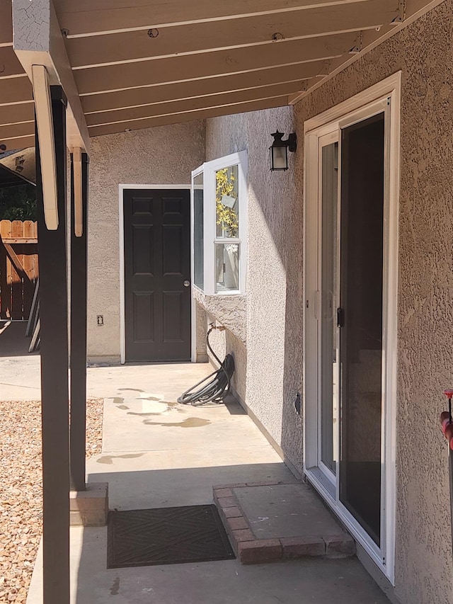6536 N Tracy Ave, Fresno, CA 93722 - entrance to property with stucco siding