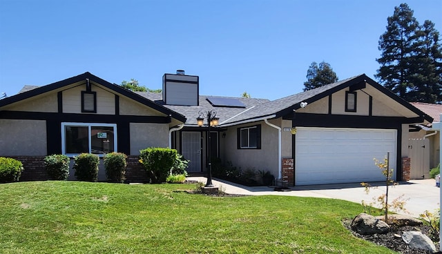 6536 N Tracy Ave, Fresno, CA 93722 - ranch-style home with a garage, a chimney, a front yard, and roof mounted solar panels