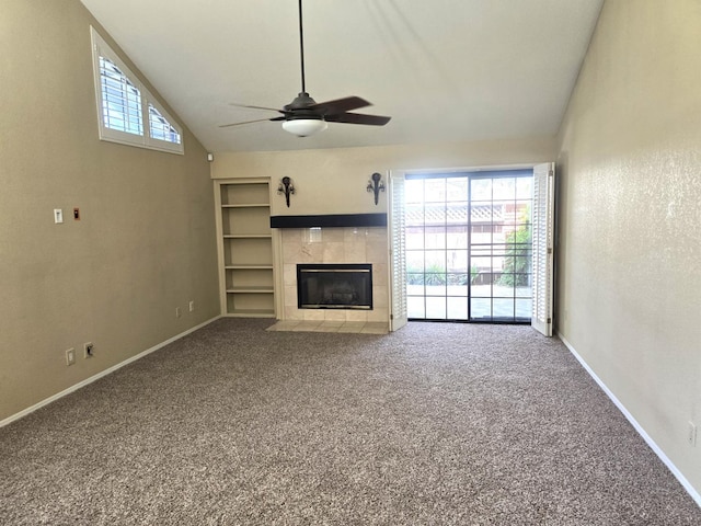 1229 W Bullard Ave Unit 105, Fresno, CA 93711 - unfurnished living room with lofted ceiling, a ceiling fan, carpet flooring, and a fireplace