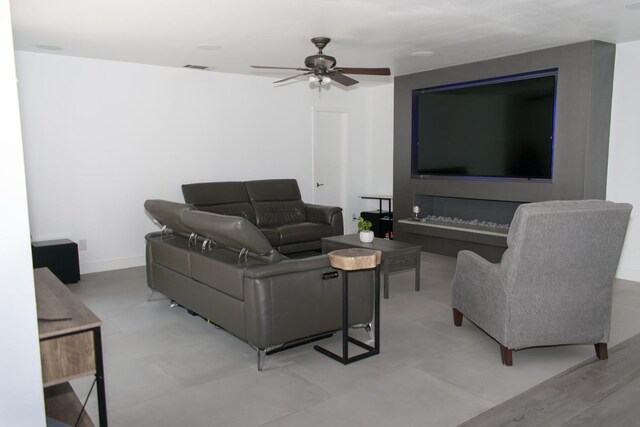 19244 W Casmalia, Rialto, CA 92377 - living room with ceiling fan and baseboards