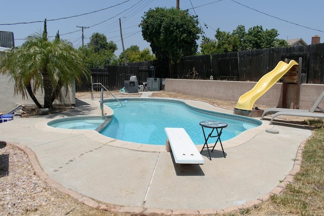19244 W Casmalia, Rialto, CA 92377 - view of swimming pool featuring a patio area, a fenced backyard, a diving board, and a playground