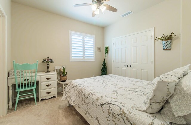 2047 Menlo Ave, Clovis, CA 93611 - bedroom featuring light carpet, a closet, and ceiling fan