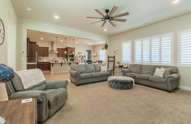 2047 Menlo Ave, Clovis, CA 93611 - living area with ceiling fan, recessed lighting, and light colored carpet