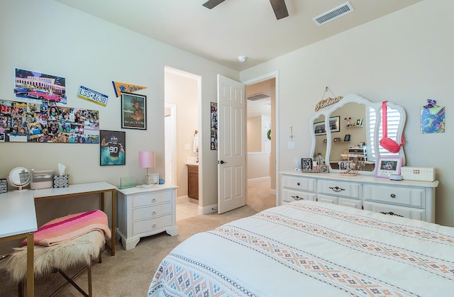 2047 Menlo Ave, Clovis, CA 93611 - bedroom featuring light carpet, ensuite bathroom, and a ceiling fan