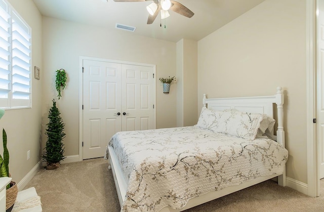 2047 Menlo Ave, Clovis, CA 93611 - bedroom featuring light carpet, multiple windows, ceiling fan, and a closet