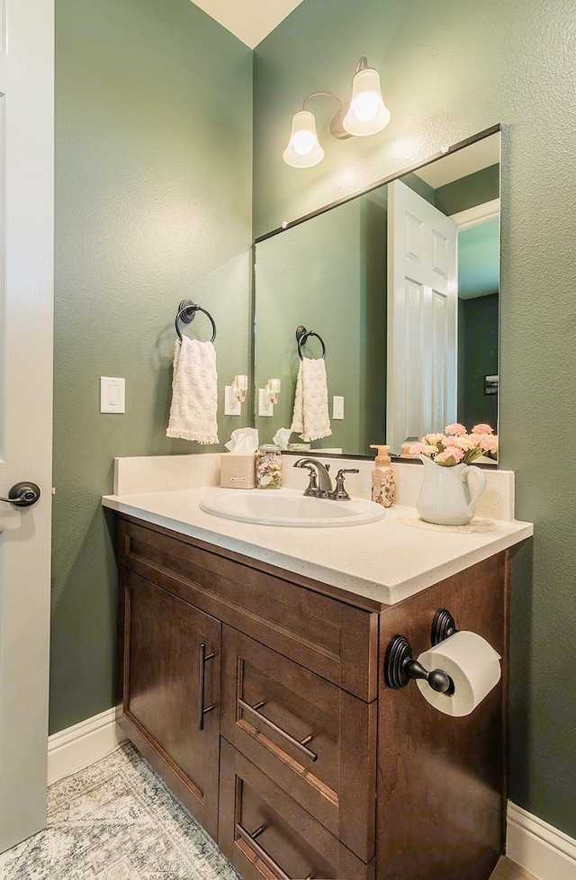2047 Menlo Ave, Clovis, CA 93611 - bathroom featuring vanity and baseboards
