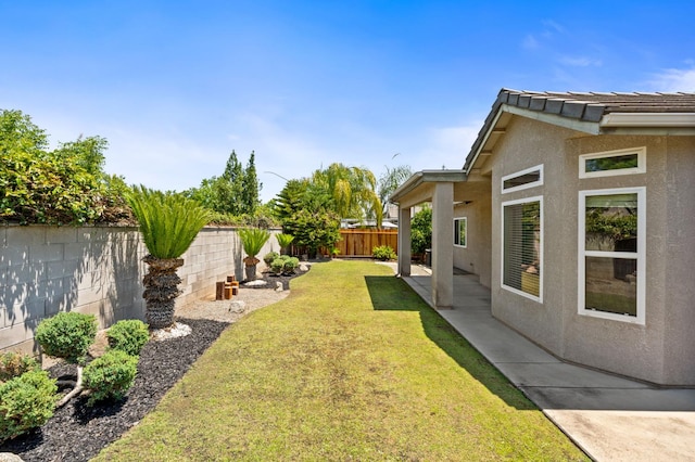 10643 N Tea Party Ln, Fresno, CA 93730 - fenced backyard with a patio area