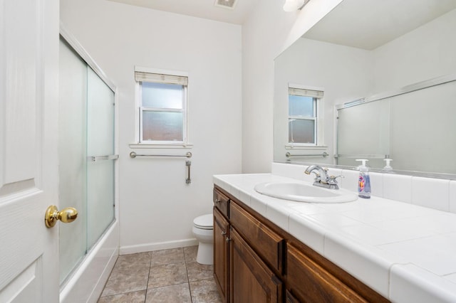 10643 N Tea Party Ln, Fresno, CA 93730 - full bathroom featuring vanity and enclosed tub / shower combo