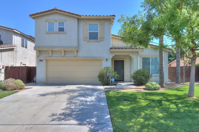 2062 Dunbar Way, Dinuba, CA 93618 - view of front of home with a tile roof, a garage, driveway, and stucco siding