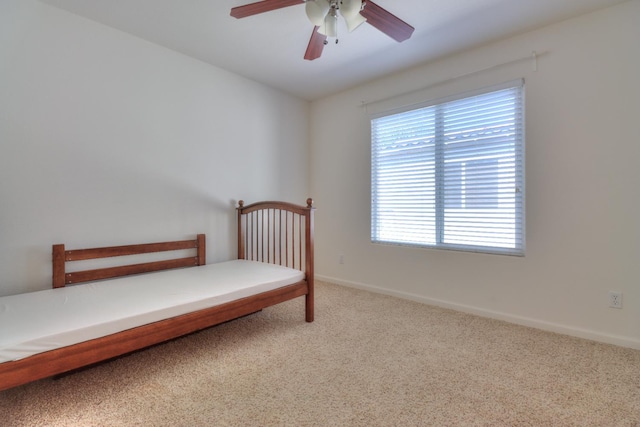 2062 Dunbar Way, Dinuba, CA 93618 - carpeted bedroom with baseboards and ceiling fan