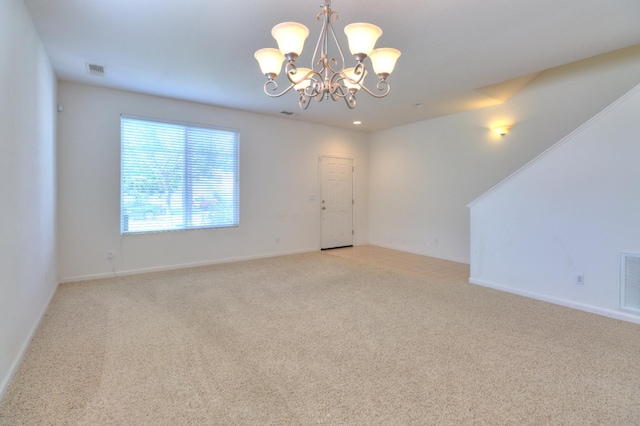 2062 Dunbar Way, Dinuba, CA 93618 - empty room with a chandelier, light colored carpet, and recessed lighting