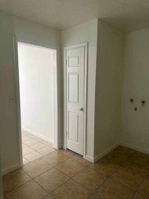 2967 E Iowa Ave, Fresno, CA 93701 - washroom with light tile patterned floors and baseboards