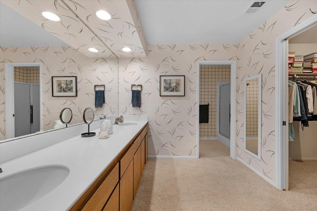5532 N El Adobe Dr, Fresno, CA 93711 - full bathroom featuring wallpapered walls, double vanity, and a walk in closet