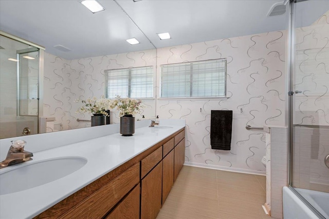 5532 N El Adobe Dr, Fresno, CA 93711 - bathroom with double vanity, enclosed tub / shower combo, and tile patterned flooring